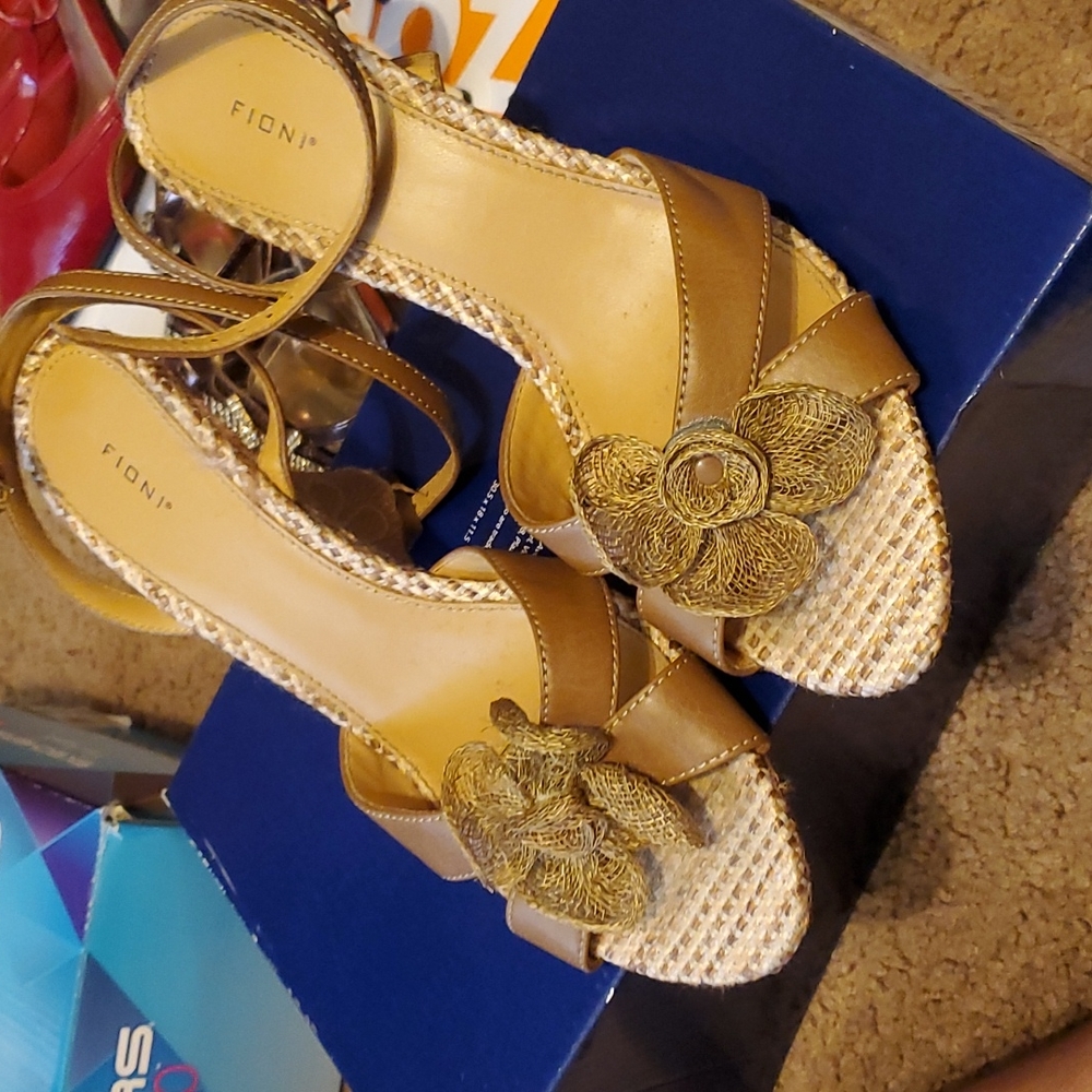 Missing half of the flower on the left shoe